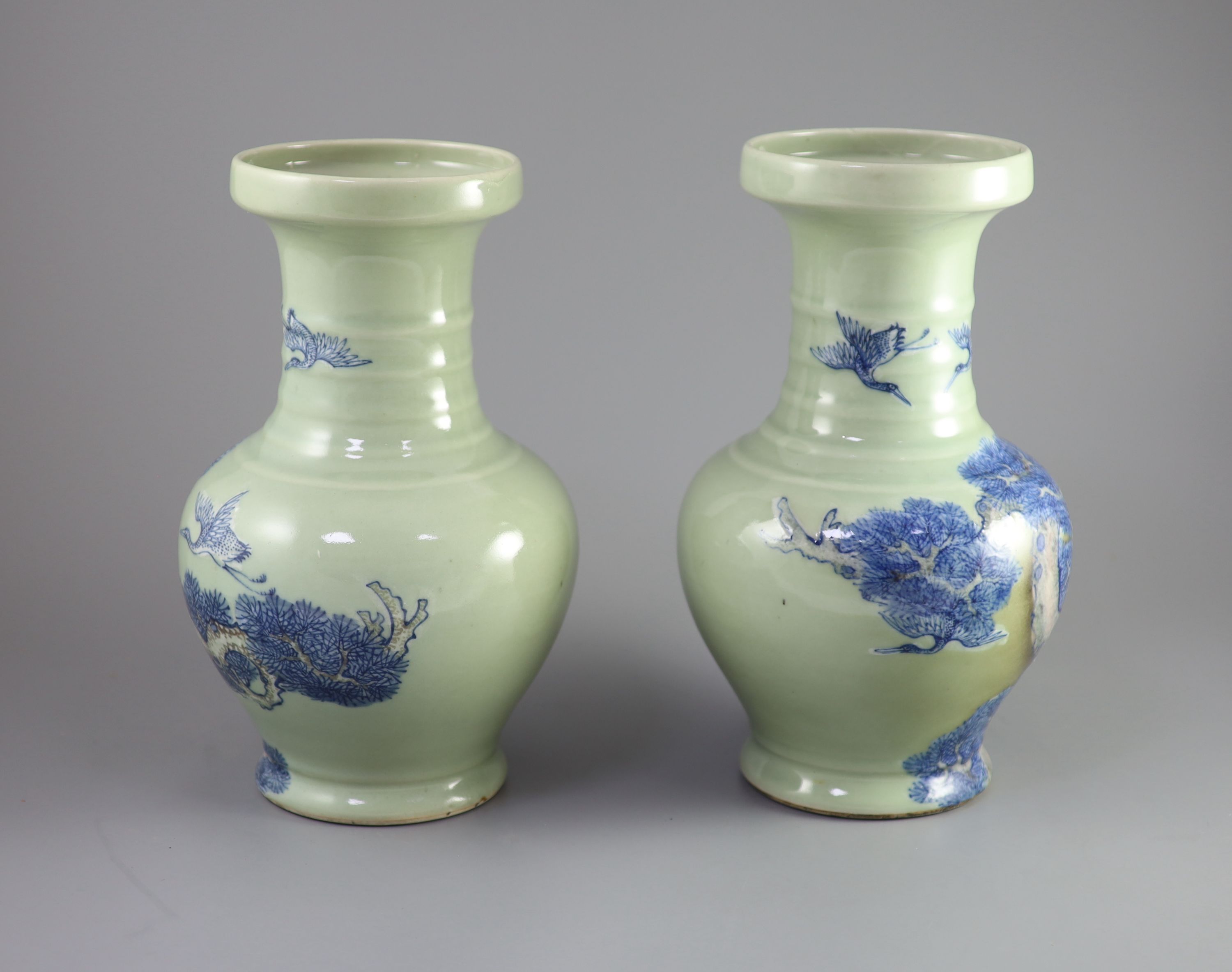 A pair of Chinese underglaze blue and copper red celadon ground vases, probably Republic period 31.5 and 32 cm high